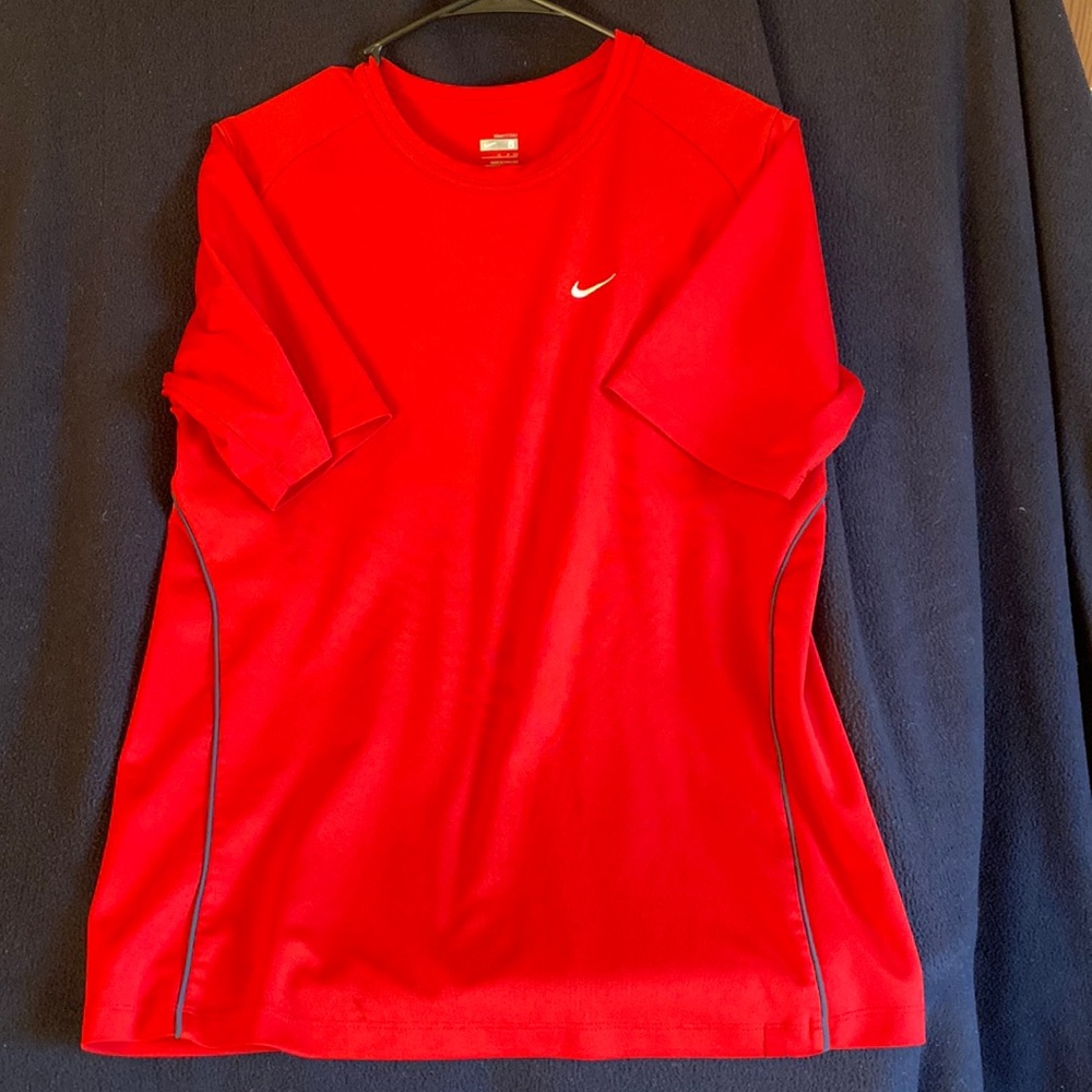 Nike fit dry mens small red shirt with black piping.